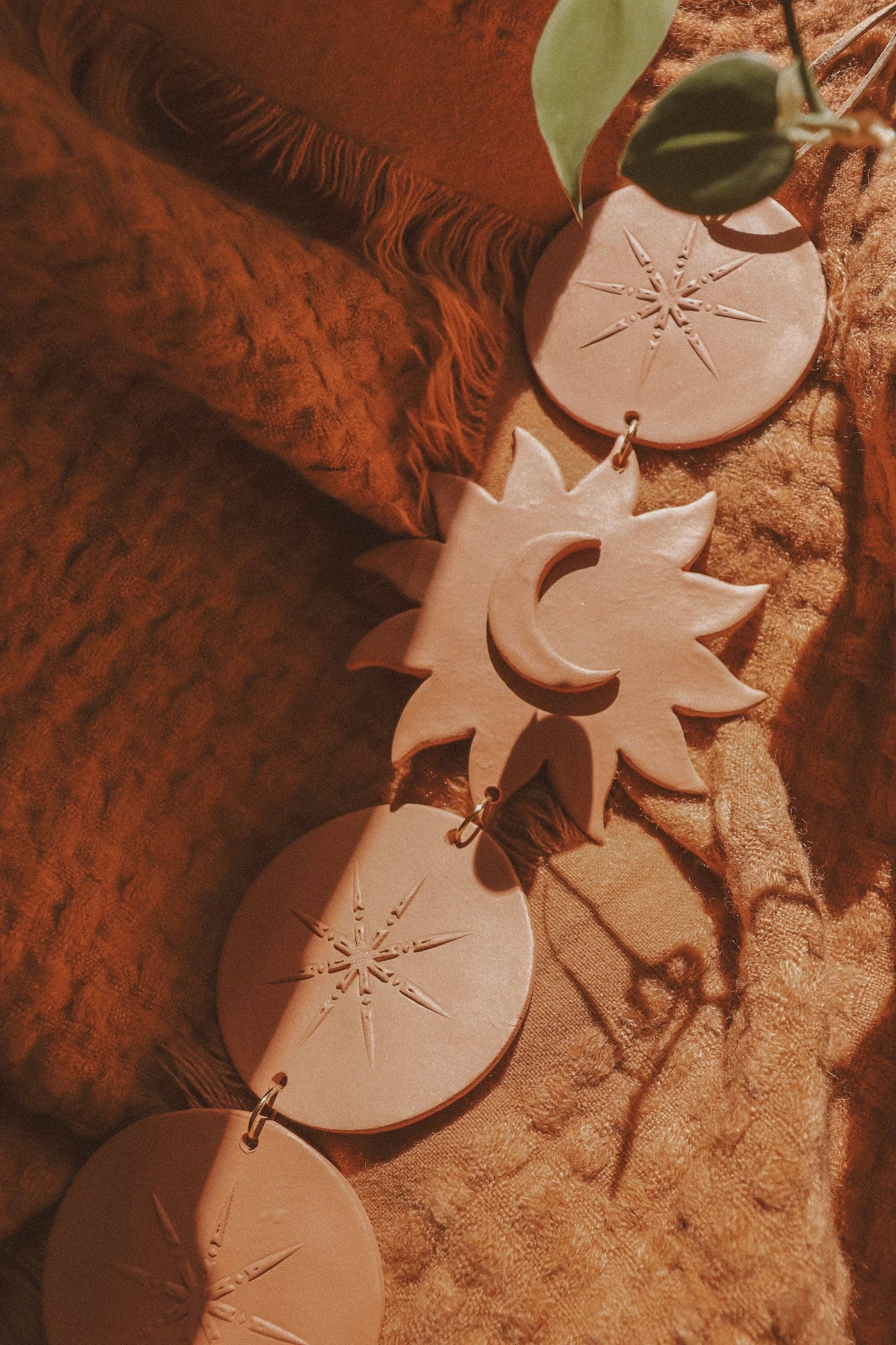 Celestial Sun and Moon Clay Wall Hanging