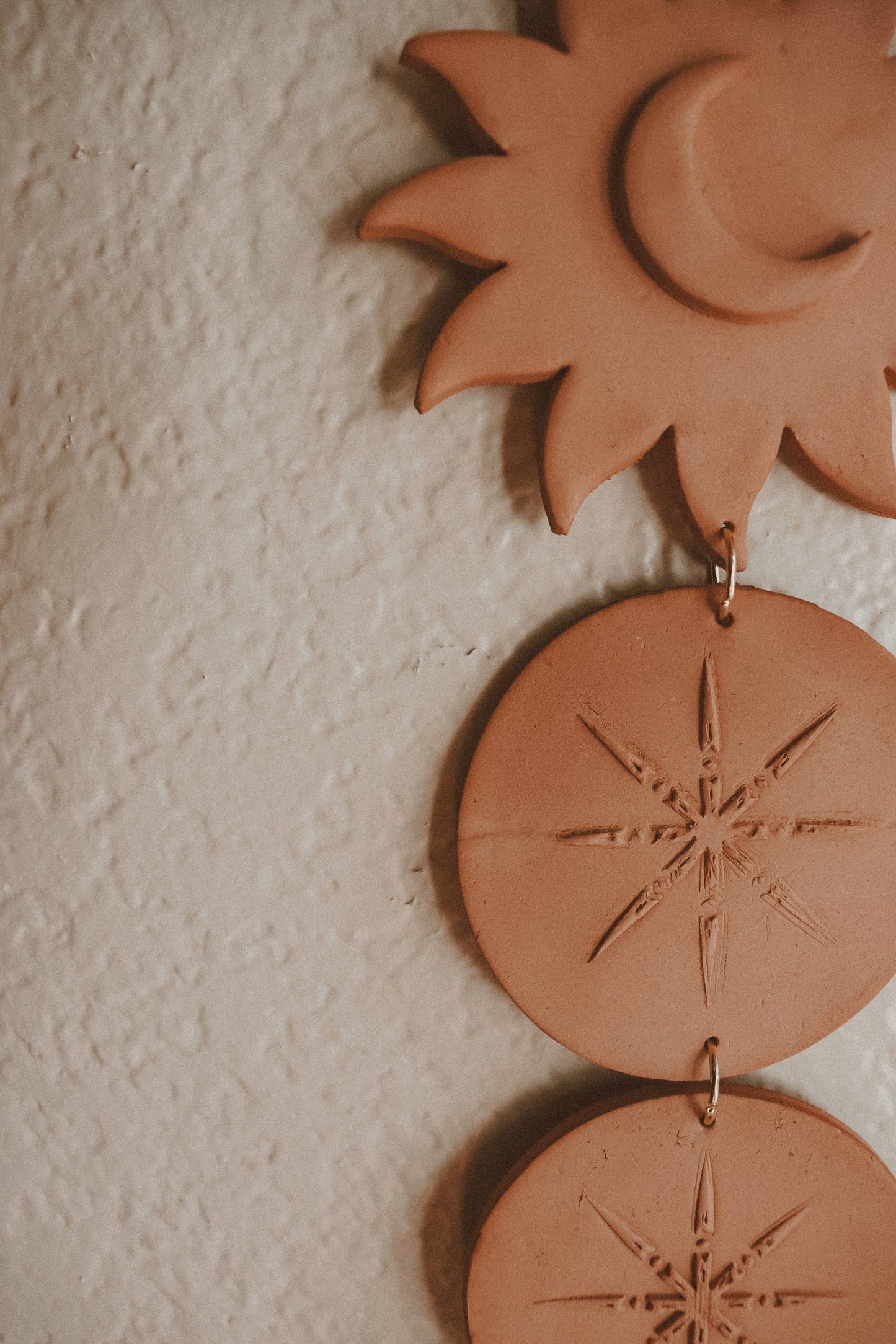 Celestial Sun and Moon Clay Wall Hanging